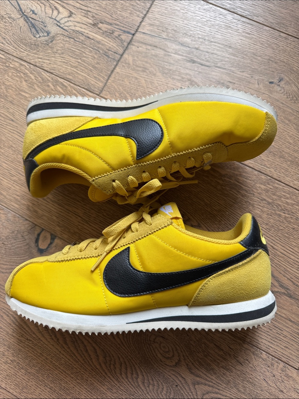 Nike Cortez Yellow Sneakers with Black Swoosh